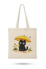 Natural cream canvas tote bag with a black cat and sunflower umbrella graphic – cute accessory to pair with a Unique Bangla Tee