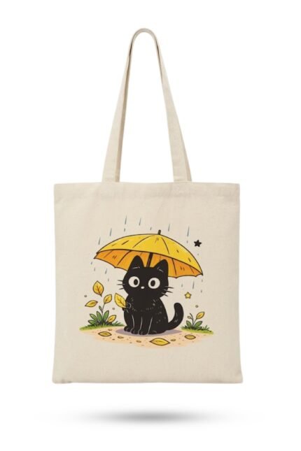 Natural cream canvas tote bag with a black cat and sunflower umbrella graphic – cute accessory to pair with a Unique Bangla Tee