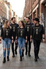 Couple walking down a city street with the man wearing a black cotton t-shirt featuring an edgy Metallica skull graphic