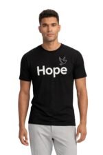 Man wearing a black cotton t-shirt featuring the motivational word Hope in clean typography
