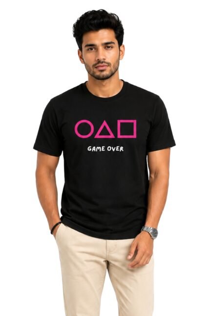 Man wearing a black cotton Men's Squid Game Inspired Graphic Printed T-Shirt with circle, triangle, and square symbols