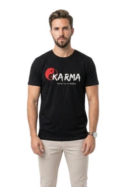 Man wearing a black cotton t-shirt with a red Karma graphic design