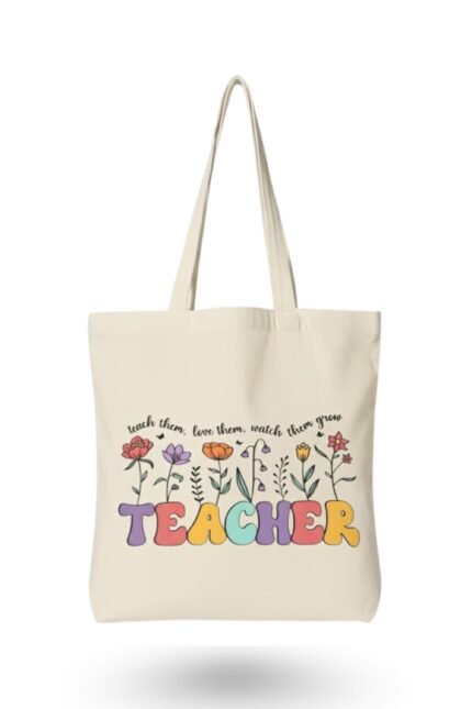 Natural cream canvas tote bag with colorful floral "TEACHER" typography – perfect inspirational gift to pair with a motivational t-shirt