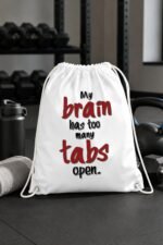 Mockup display of white cotton canvas drawstring backpacks featuring My brain has too many tabs open text