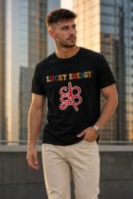 Close-up mockup of a man wearing the premium cotton Lucky Energy Streetwear Tee showing the red lucky knot print.