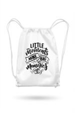 Stilotee white cotton canvas drawstring backpack featuring aesthetic minimalist Little Moments quote typography print