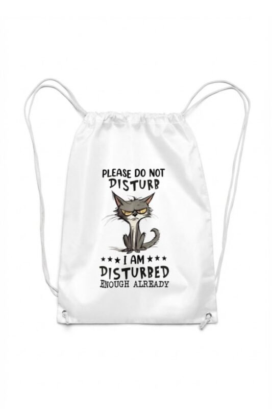 A white canvas drawstring backpack featuring a funny minimalist graphic illustration of a chaotic, grumpy grey cat with yellow eyes and text that reads "Please Do Not Disturb" and "I Am Disturbed Enough Already".