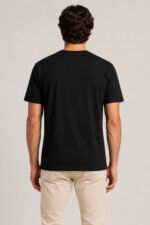 Back view of male model wearing solid jet black regular fit cotton crewneck t-shirt.
